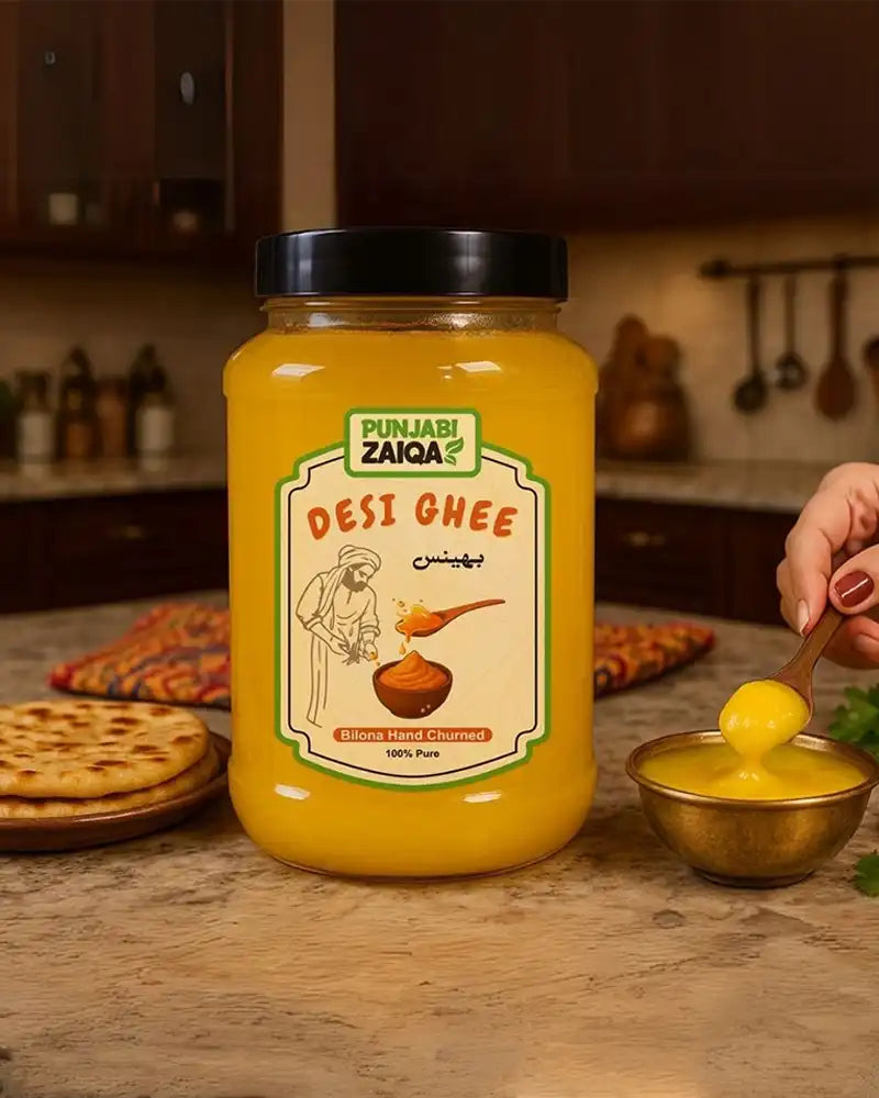 Jar of Punjabi Zaika Desi Ghee with a hand scooping ghee into a bowl in a kitchen setting.